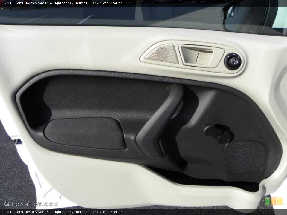 Light Stone/Charcoal Black Cloth Interior Door Panel for the 2011 Ford Fiesta S Sedan #39021203