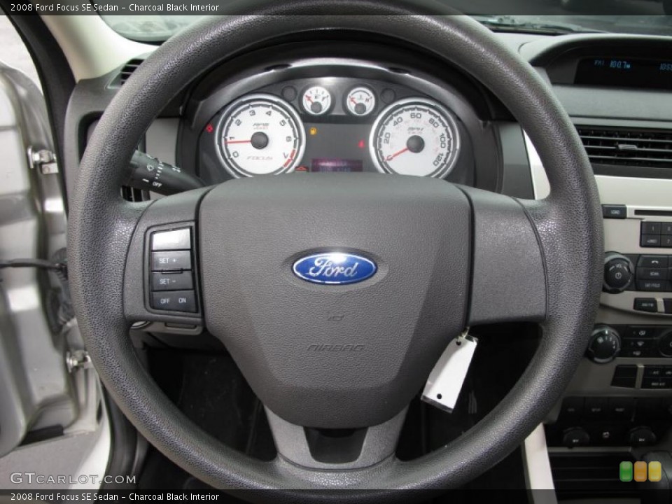 Charcoal Black Interior Steering Wheel for the 2008 Ford Focus SE Sedan #39035451