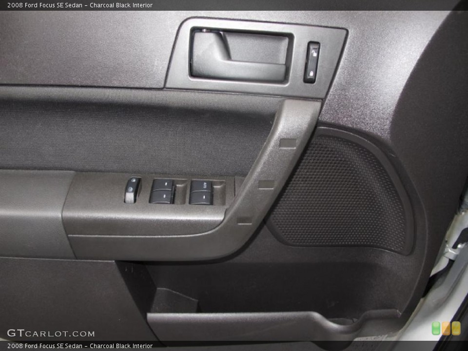 Charcoal Black Interior Door Panel for the 2008 Ford Focus SE Sedan #39035467