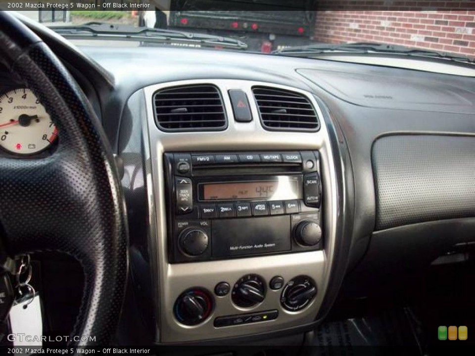 Off Black Interior Controls for the 2002 Mazda Protege 5 Wagon #39039603