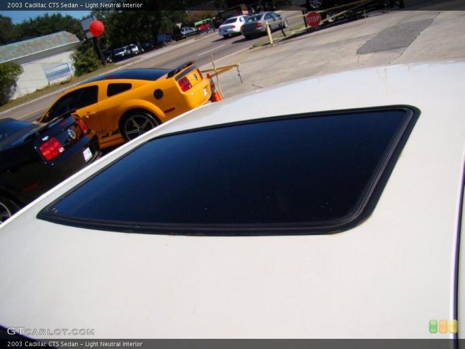 Light Neutral Interior Sunroof for the 2003 Cadillac CTS Sedan #39045636