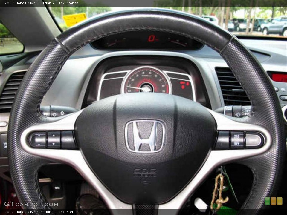 Black Interior Steering Wheel for the 2007 Honda Civic Si Sedan #39048608