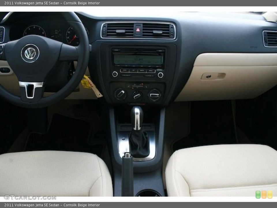 Cornsilk Beige Interior Dashboard for the 2011 Volkswagen Jetta SE Sedan #39058144