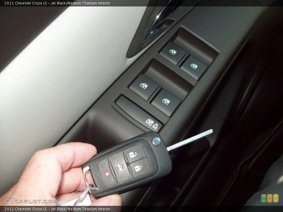 Jet Black/Medium Titanium Interior Controls for the 2011 Chevrolet Cruze LS #39073123