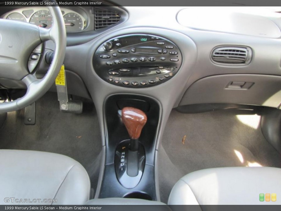 Medium Graphite Interior Dashboard for the 1999 Mercury Sable LS Sedan #39074303
