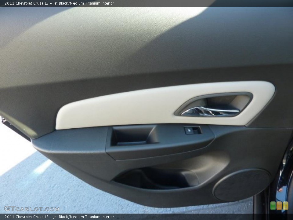 Jet Black/Medium Titanium Interior Door Panel for the 2011 Chevrolet Cruze LS #39077911