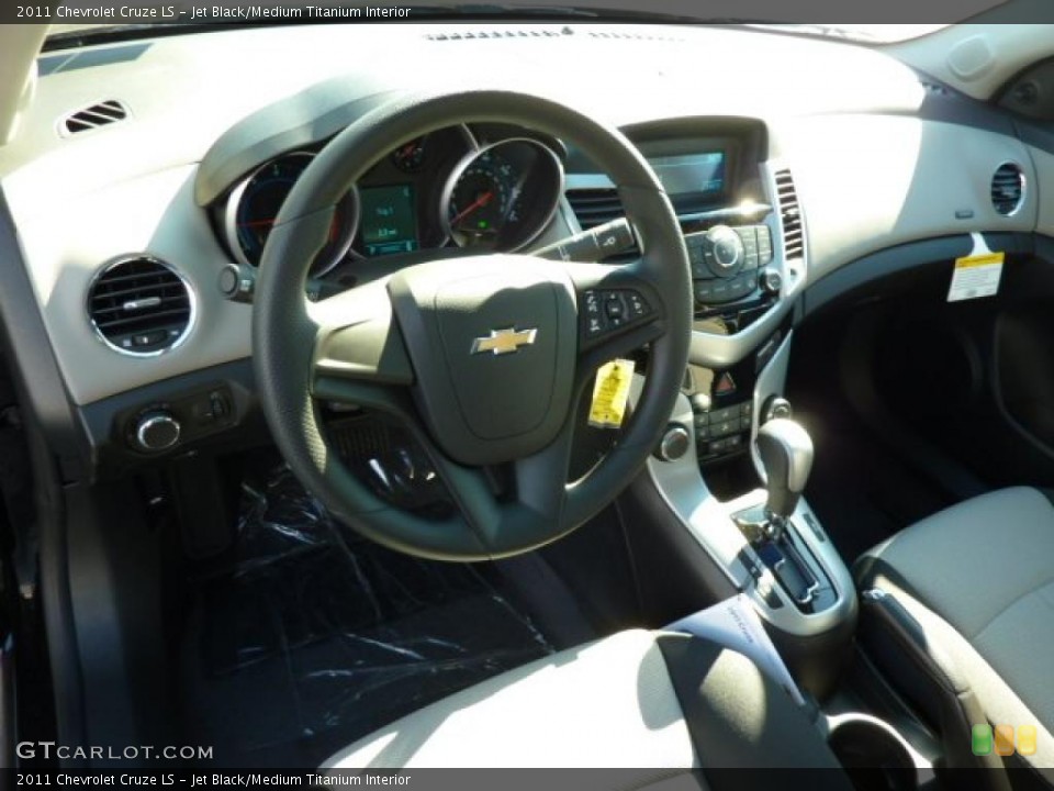 Jet Black/Medium Titanium Interior Prime Interior for the 2011 Chevrolet Cruze LS #39078155