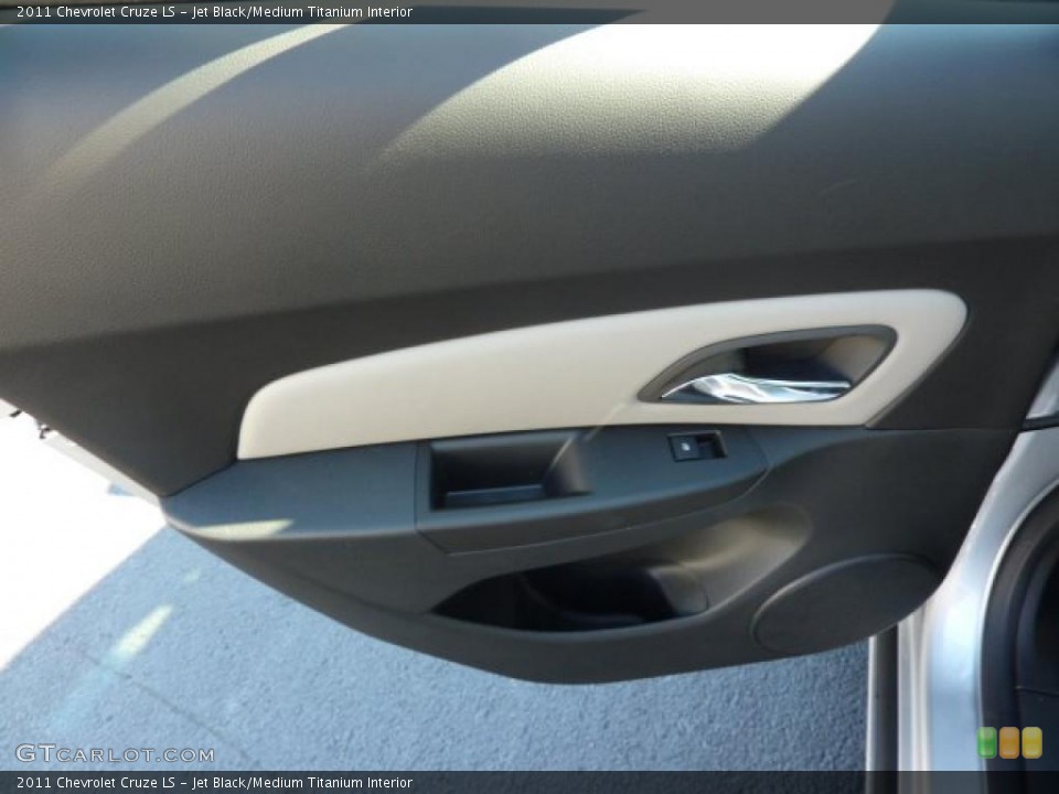 Jet Black/Medium Titanium Interior Door Panel for the 2011 Chevrolet Cruze LS #39079391