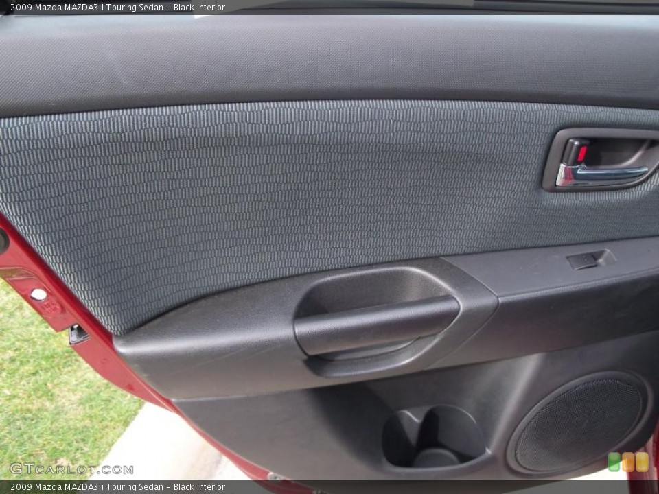 Black Interior Door Panel for the 2009 Mazda MAZDA3 i Touring Sedan #39098510