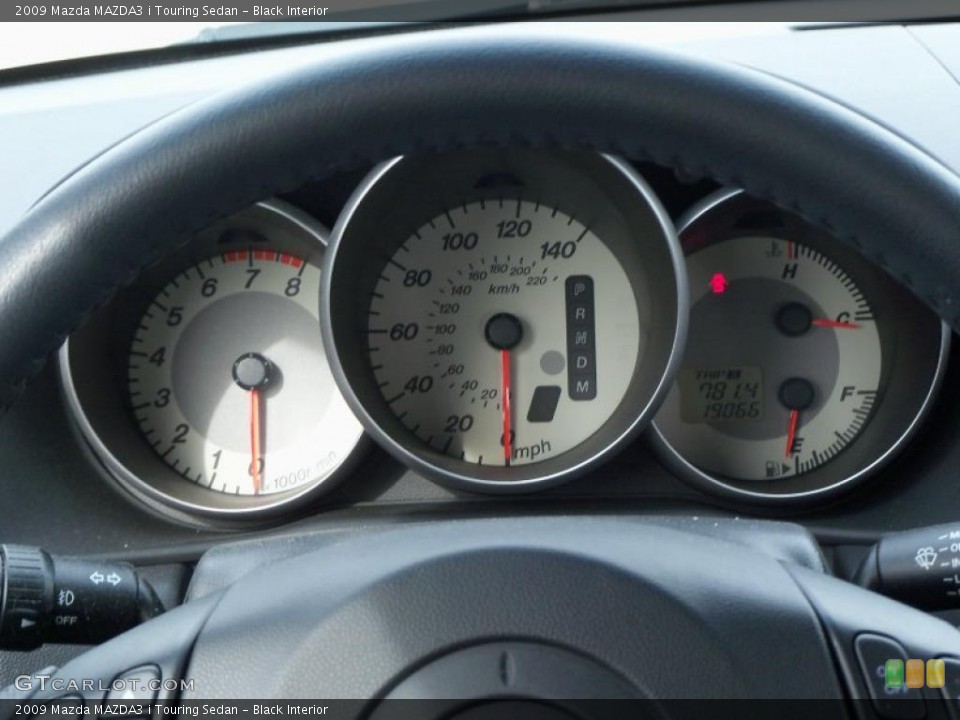 Black Interior Gauges for the 2009 Mazda MAZDA3 i Touring Sedan #39098646