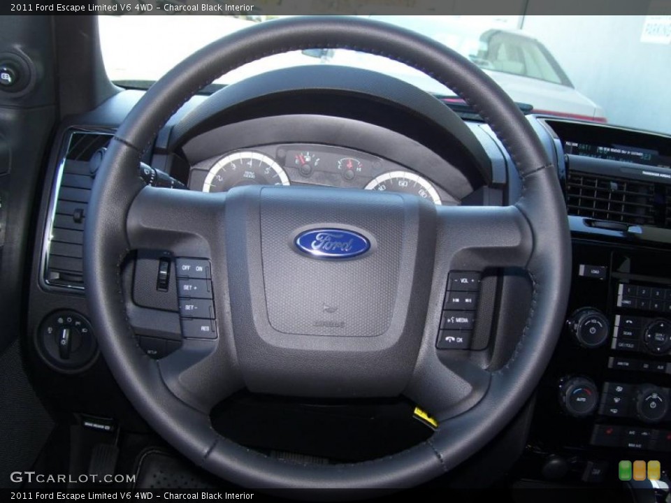 Charcoal Black Interior Steering Wheel for the 2011 Ford Escape Limited V6 4WD #39101814