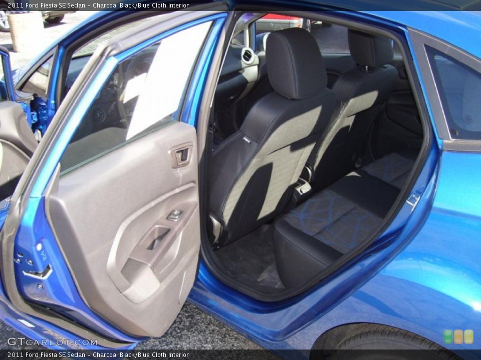Charcoal Black/Blue Cloth Interior Photo for the 2011 Ford Fiesta SE Sedan #39127447