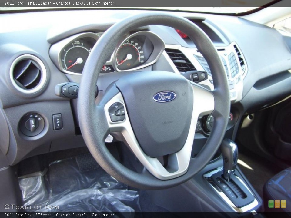 Charcoal Black/Blue Cloth Interior Dashboard for the 2011 Ford Fiesta SE Sedan #39127495