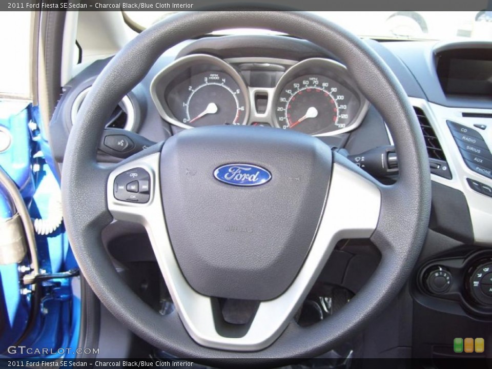 Charcoal Black/Blue Cloth Interior Steering Wheel for the 2011 Ford Fiesta SE Sedan #39127511