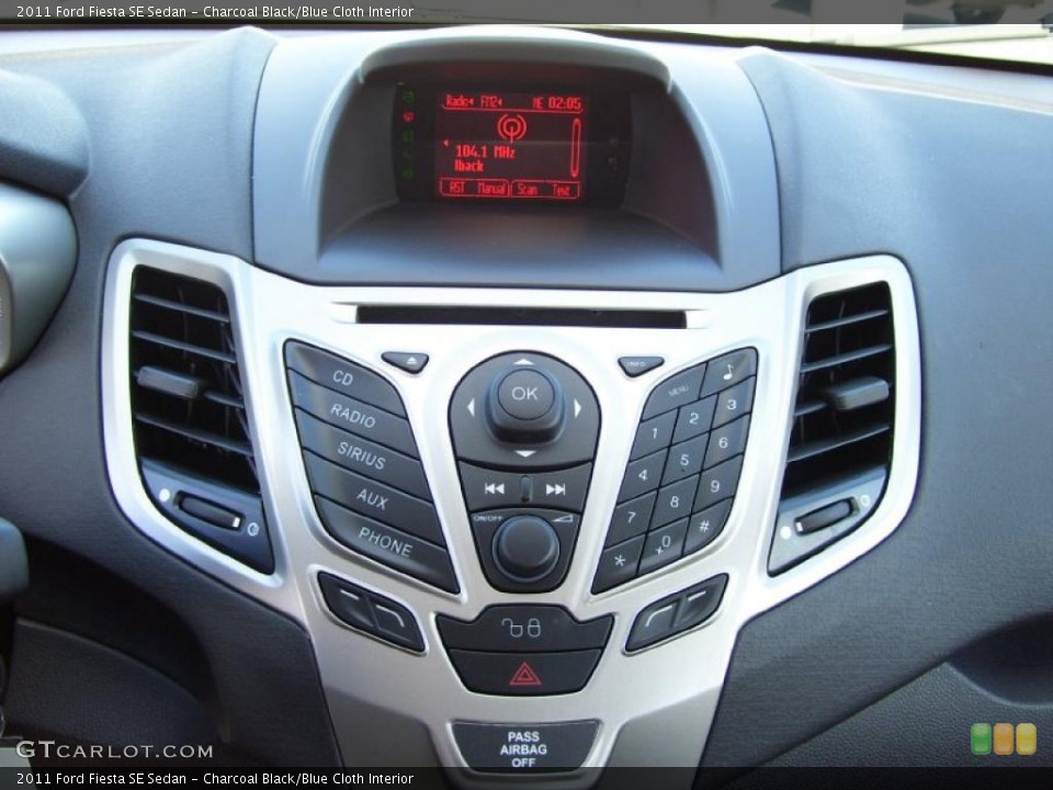 Charcoal Black/Blue Cloth Interior Controls for the 2011 Ford Fiesta SE Sedan #39127607