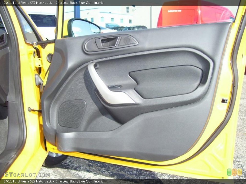 Charcoal Black/Blue Cloth Interior Door Panel for the 2011 Ford Fiesta SES Hatchback #39127943