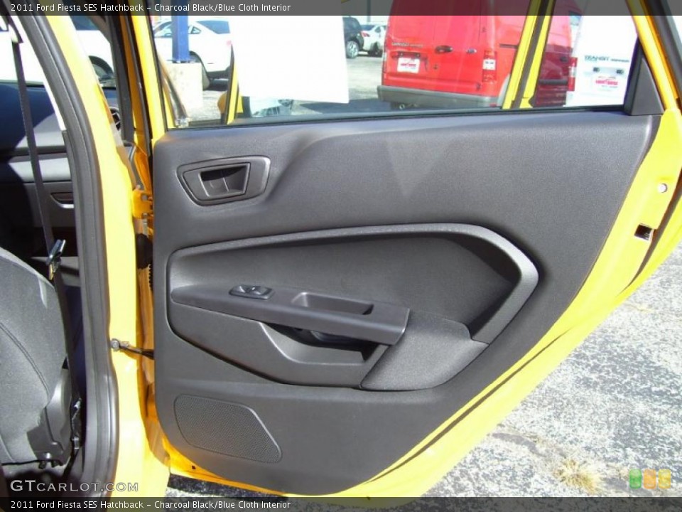 Charcoal Black/Blue Cloth Interior Door Panel for the 2011 Ford Fiesta SES Hatchback #39127955