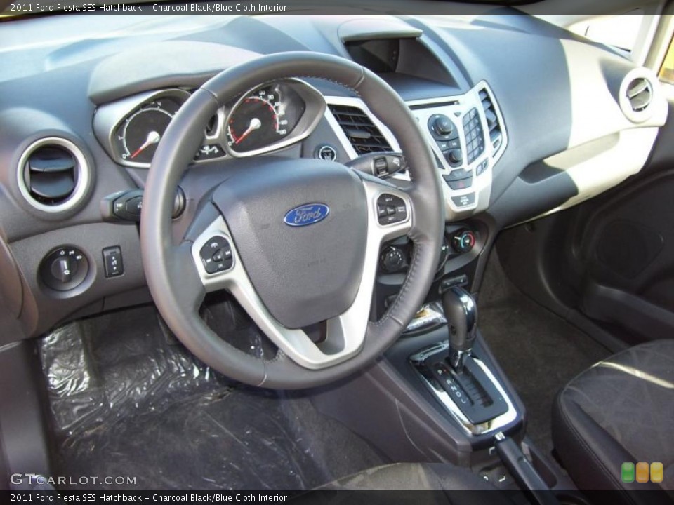 Charcoal Black/Blue Cloth Interior Prime Interior for the 2011 Ford Fiesta SES Hatchback #39128099