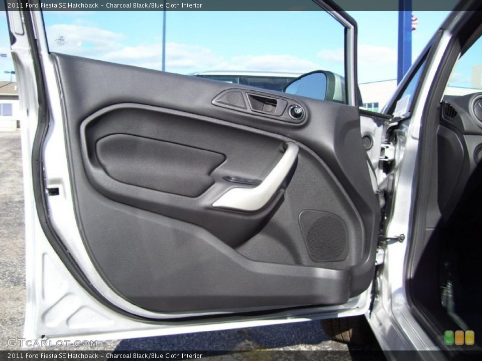 Charcoal Black/Blue Cloth Interior Door Panel for the 2011 Ford Fiesta SE Hatchback #39128495
