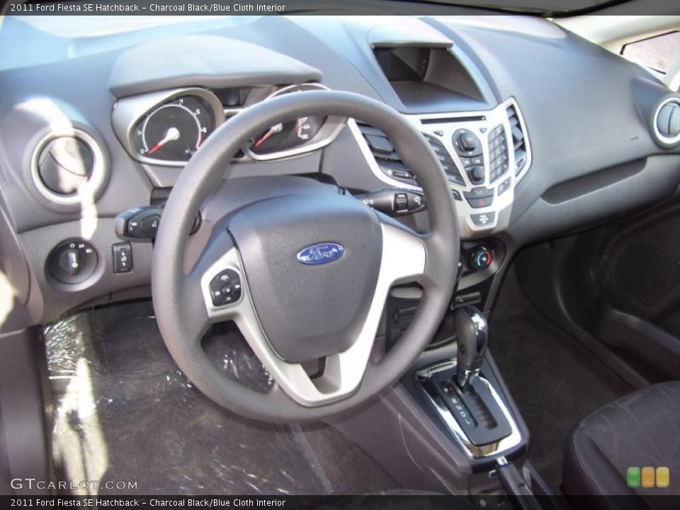 Charcoal Black/Blue Cloth Interior Dashboard for the 2011 Ford Fiesta SE Hatchback #39128615