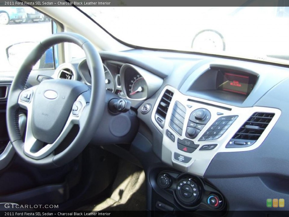 Charcoal Black Leather Interior Controls for the 2011 Ford Fiesta SEL Sedan #39129259