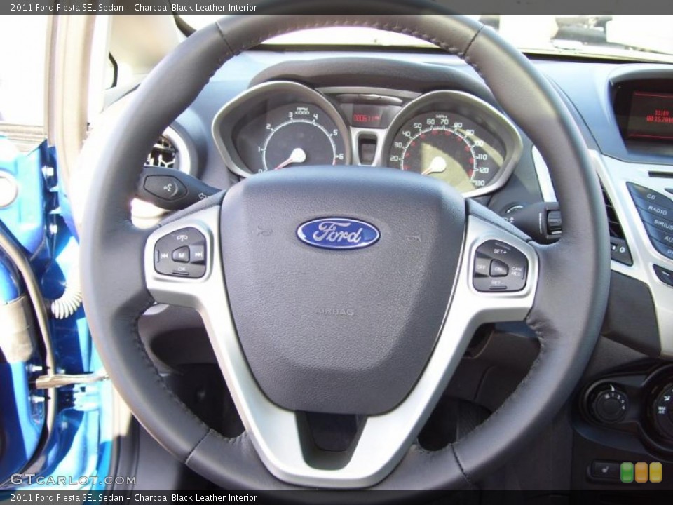 Charcoal Black Leather Interior Steering Wheel for the 2011 Ford Fiesta SEL Sedan #39129295