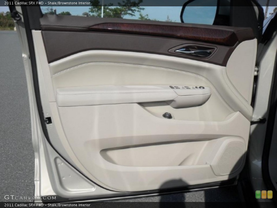 Shale/Brownstone Interior Door Panel for the 2011 Cadillac SRX FWD #39136246