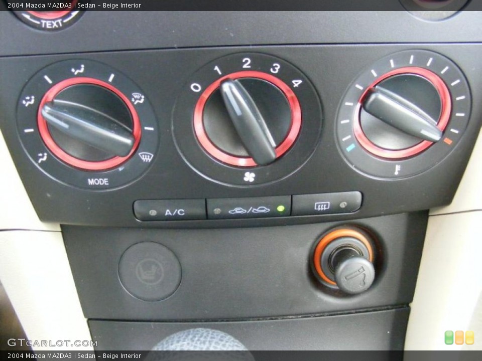 Beige Interior Controls for the 2004 Mazda MAZDA3 i Sedan #39137902