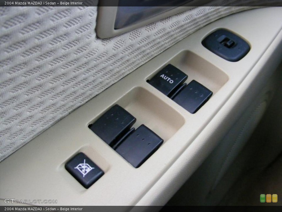 Beige Interior Controls for the 2004 Mazda MAZDA3 i Sedan #39137938