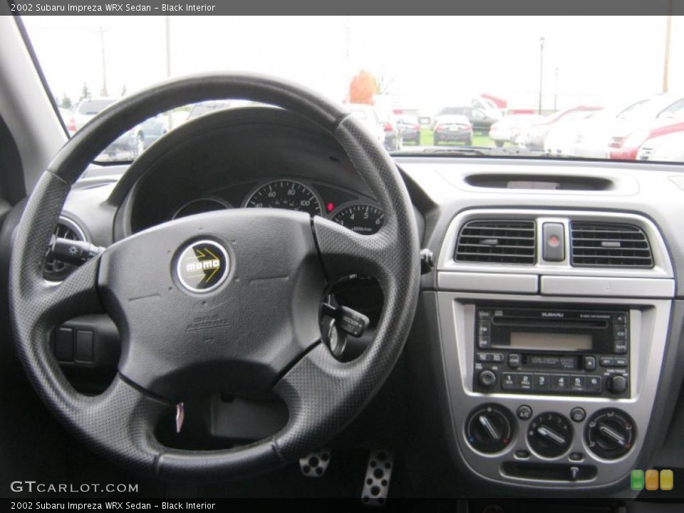 Black Interior Dashboard for the 2002 Subaru Impreza WRX Sedan #39145382