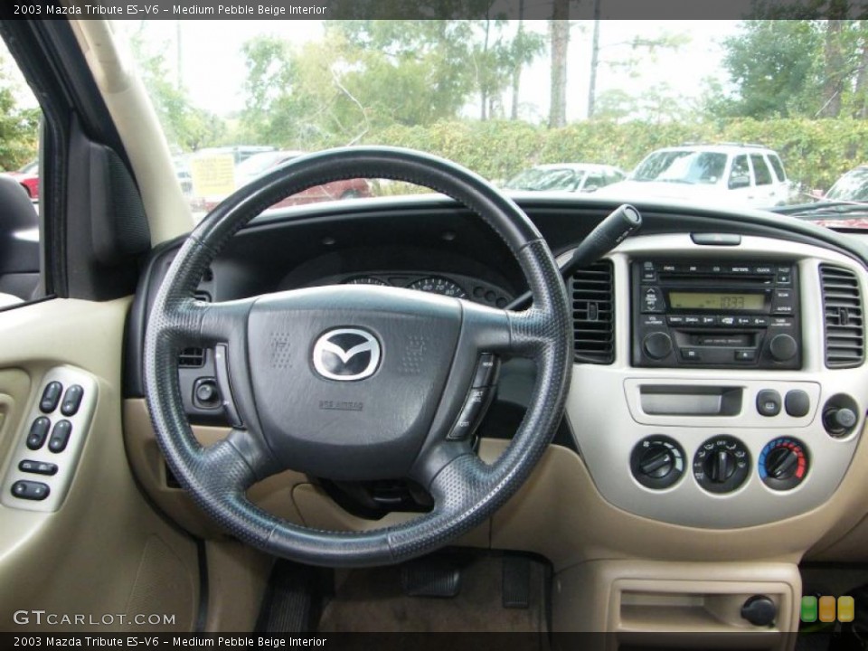 Medium Pebble Beige Interior Dashboard for the 2003 Mazda Tribute ES-V6 #39147322