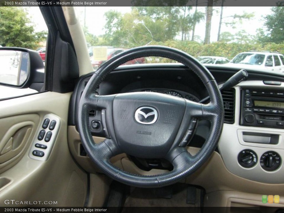 Medium Pebble Beige Interior Steering Wheel for the 2003 Mazda Tribute ES-V6 #39147330