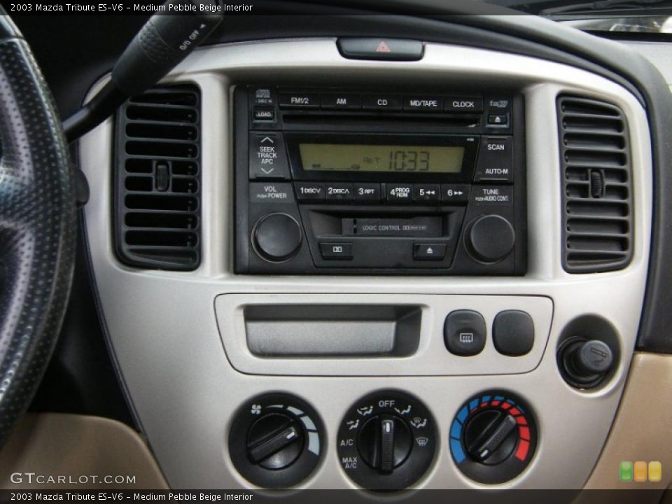 Medium Pebble Beige Interior Controls for the 2003 Mazda Tribute ES-V6 #39147342