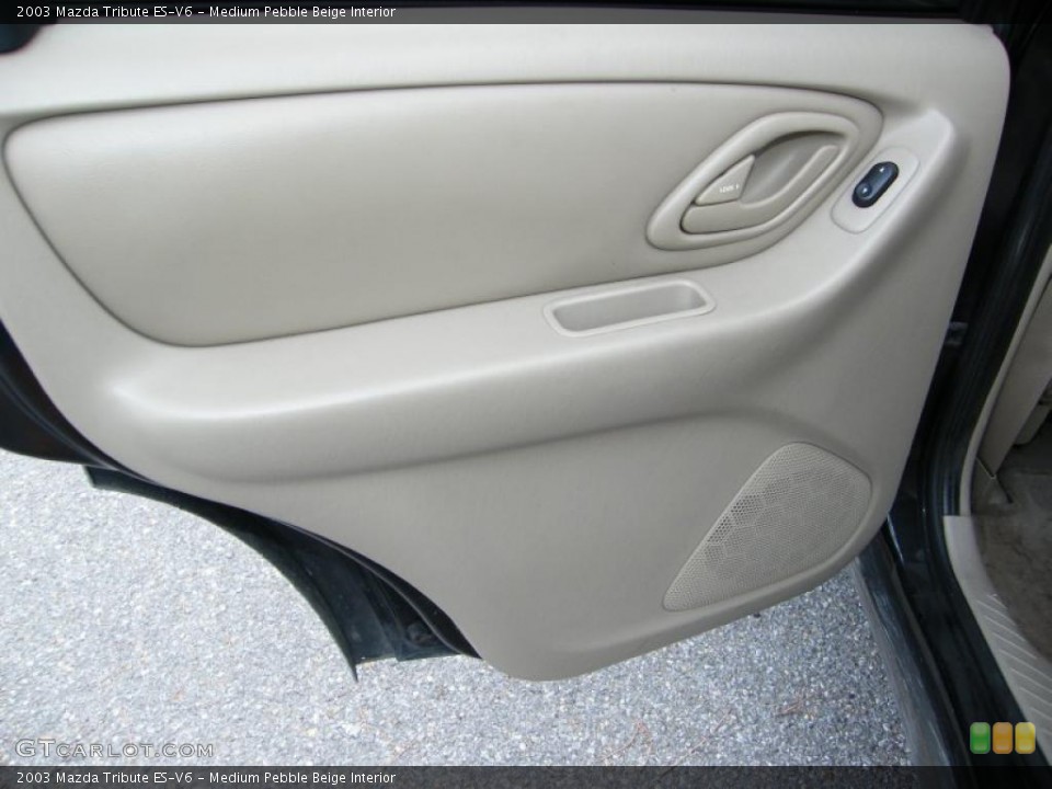 Medium Pebble Beige Interior Door Panel for the 2003 Mazda Tribute ES-V6 #39147354