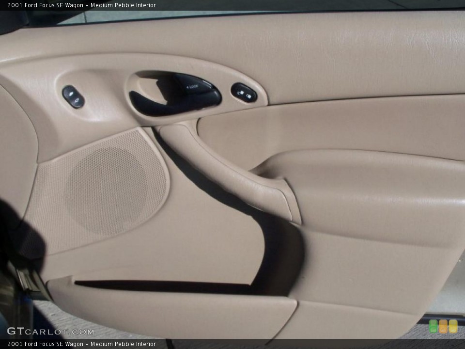 Medium Pebble Interior Door Panel for the 2001 Ford Focus SE Wagon #39169146