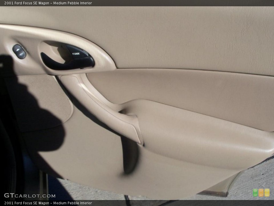 Medium Pebble Interior Door Panel for the 2001 Ford Focus SE Wagon #39169166