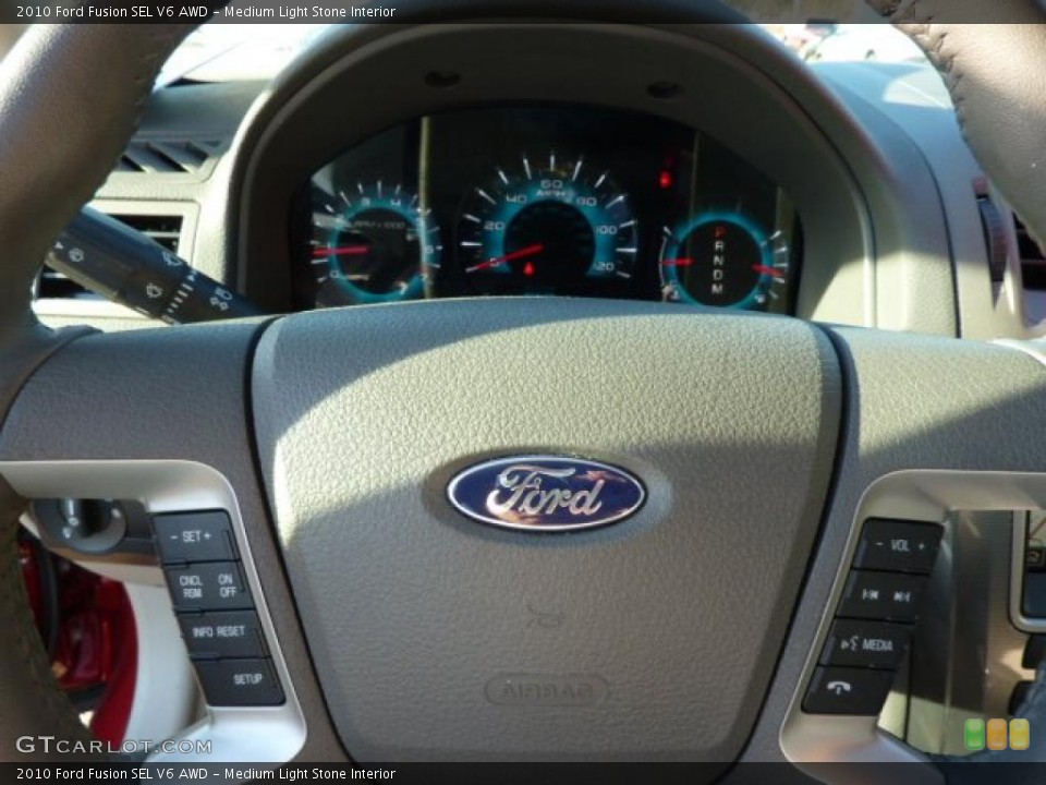 Medium Light Stone Interior Controls for the 2010 Ford Fusion SEL V6 AWD #39170283