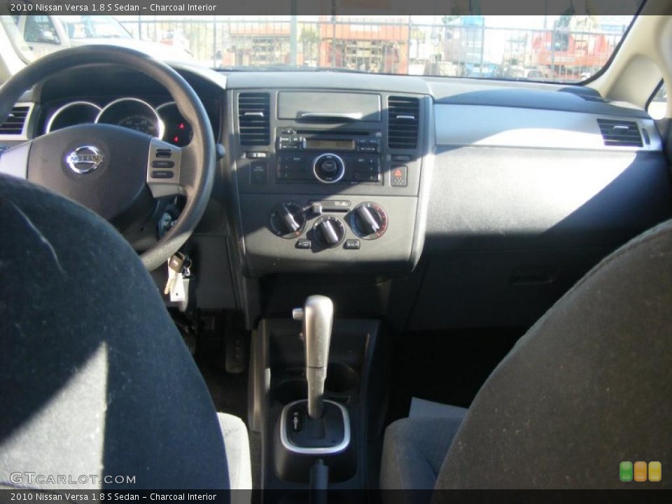 Charcoal Interior Dashboard for the 2010 Nissan Versa 1.8 S Sedan #39172742