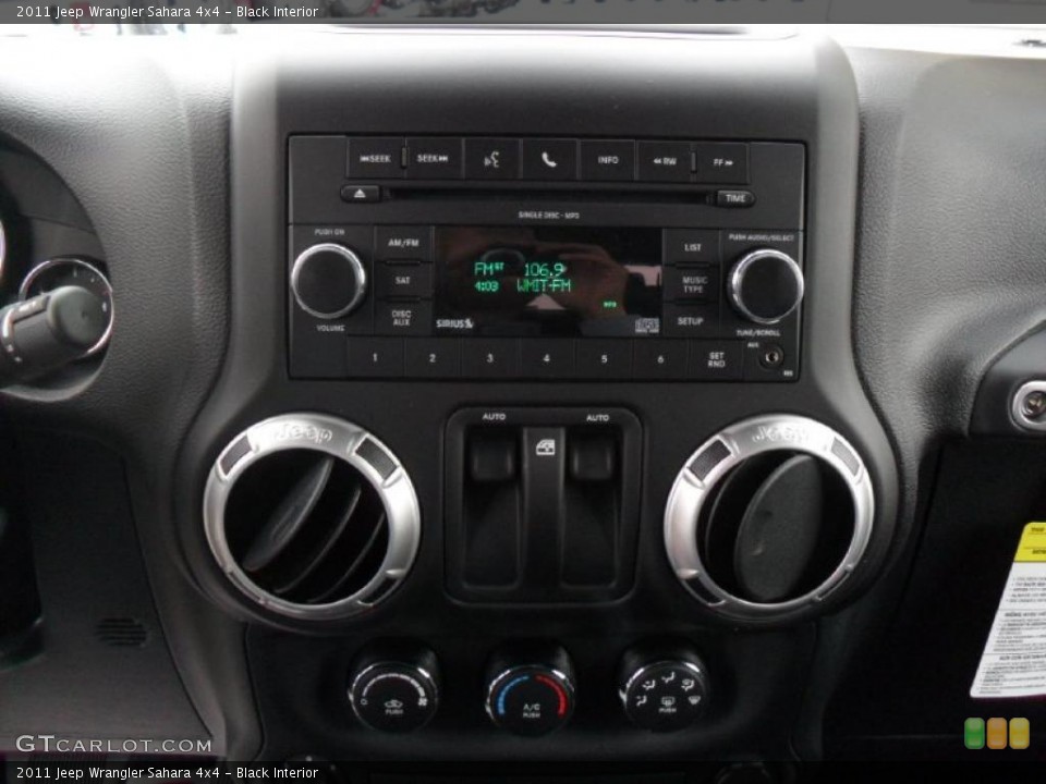 Black Interior Controls for the 2011 Jeep Wrangler Sahara 4x4 #39183061