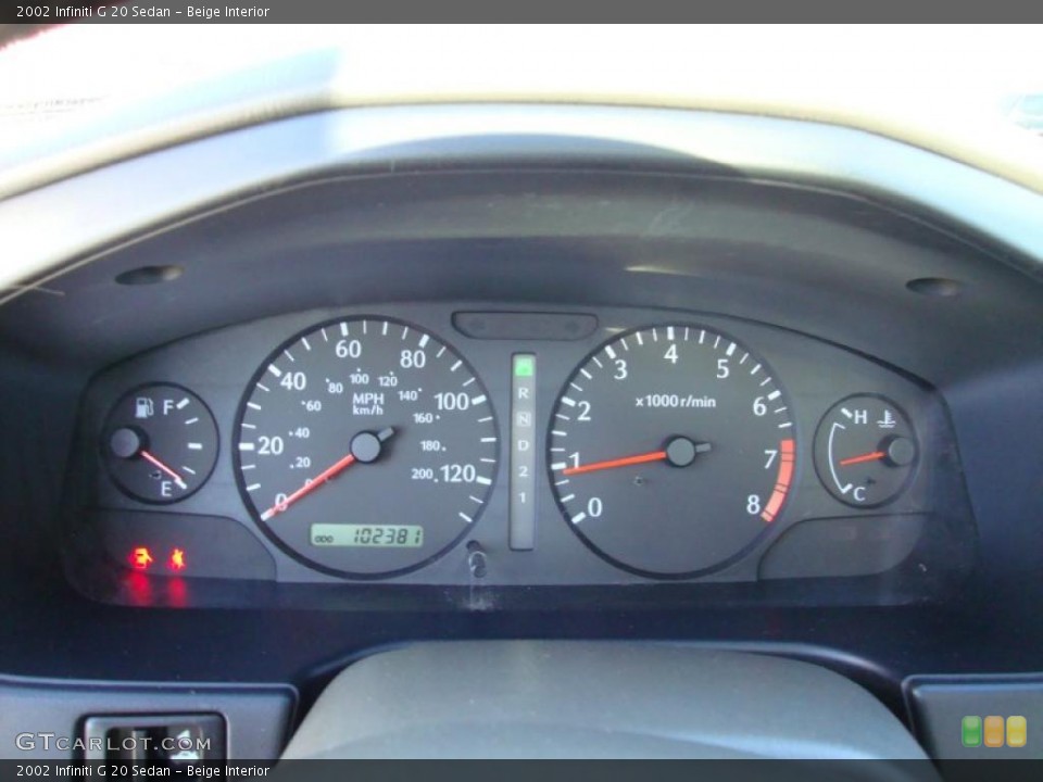 Beige Interior Gauges for the 2002 Infiniti G 20 Sedan #39183391