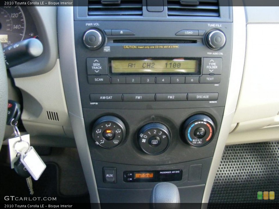 Bisque Interior Controls for the 2010 Toyota Corolla LE #39192115