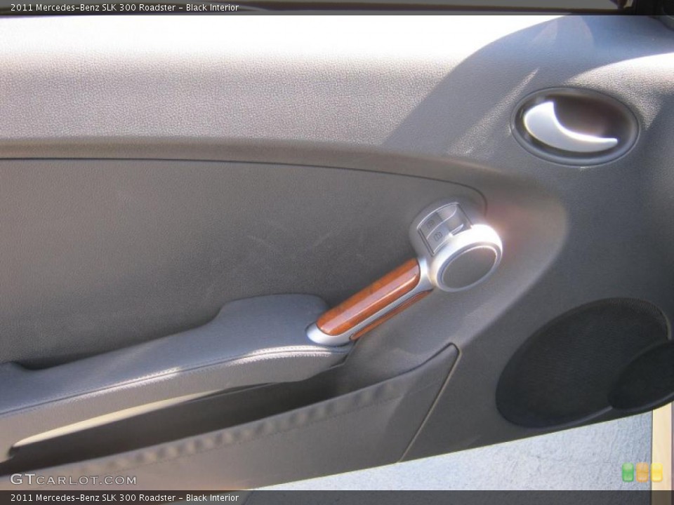Black Interior Door Panel for the 2011 Mercedes-Benz SLK 300 Roadster #39193651