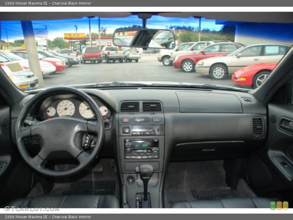 Charcoal Black Interior Dashboard for the 1999 Nissan Maxima SE #39196299