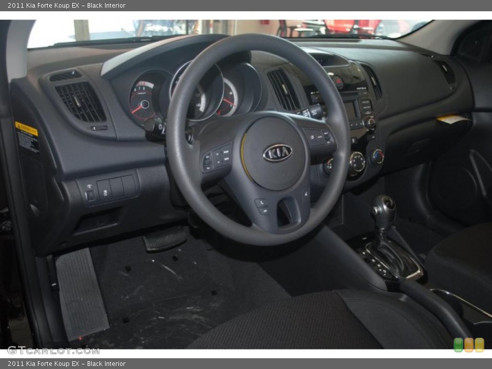 Black Interior Prime Interior for the 2011 Kia Forte Koup EX #39196391