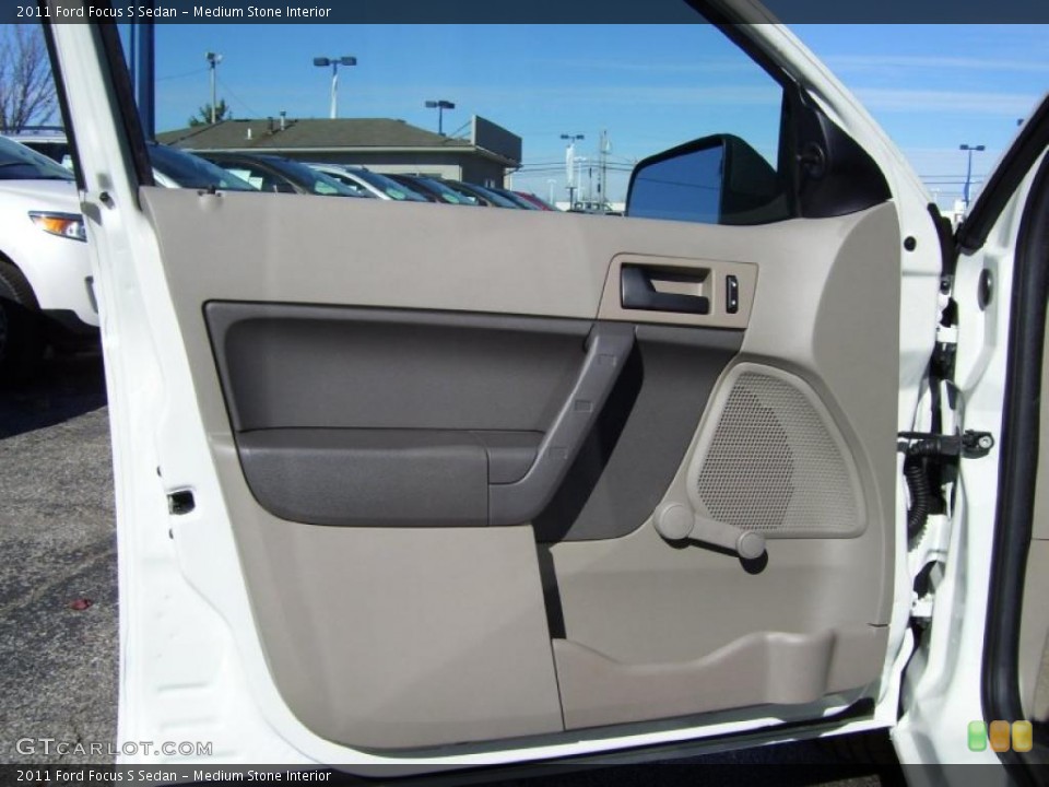 Medium Stone Interior Door Panel for the 2011 Ford Focus S Sedan #39197859