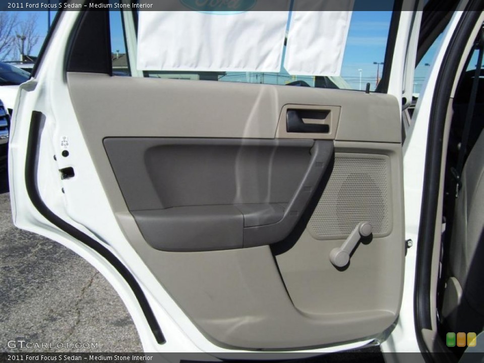 Medium Stone Interior Door Panel for the 2011 Ford Focus S Sedan #39197879
