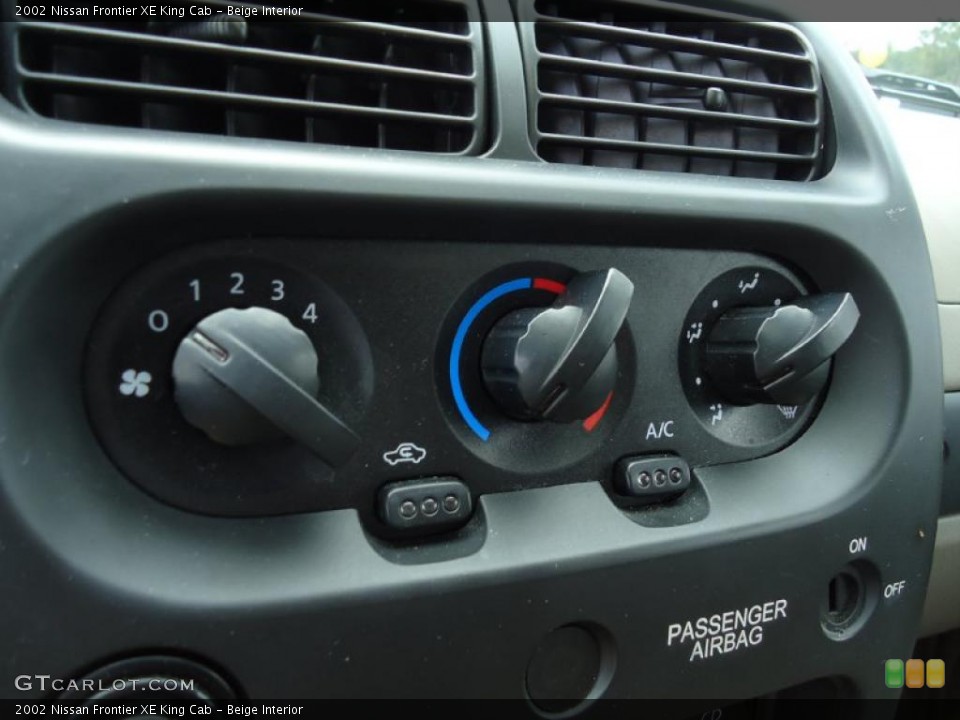Beige Interior Controls for the 2002 Nissan Frontier XE King Cab #39199633