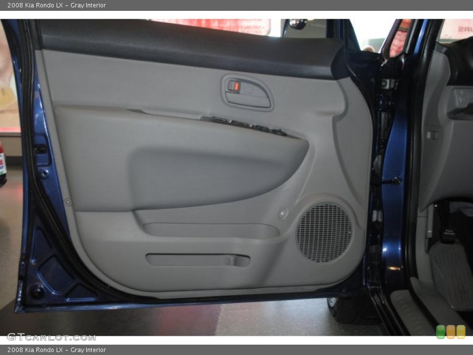 Gray Interior Door Panel for the 2008 Kia Rondo LX #39202763