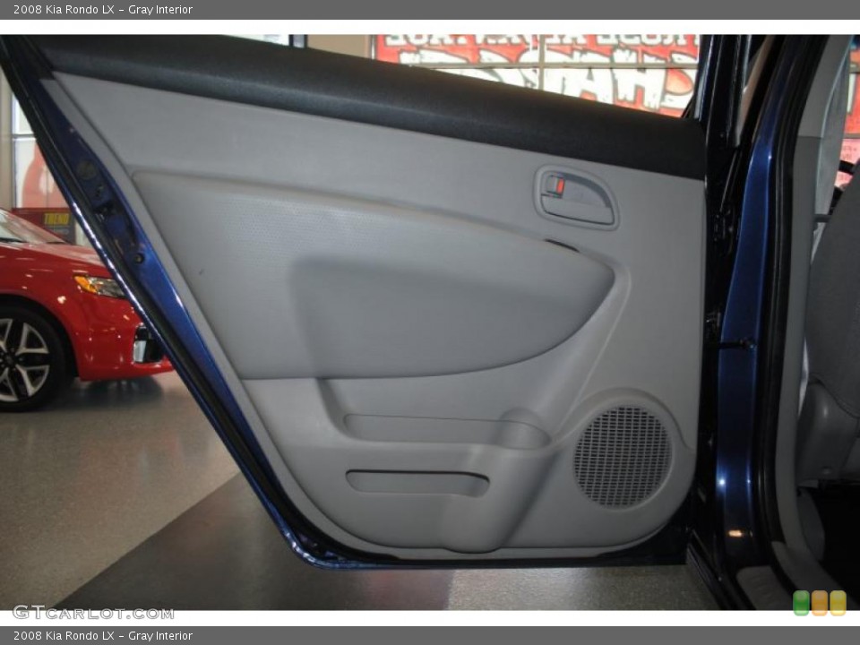 Gray Interior Door Panel for the 2008 Kia Rondo LX #39202811