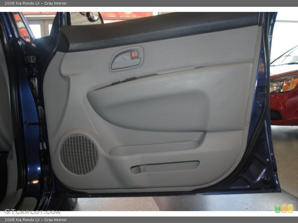 Gray Interior Door Panel for the 2008 Kia Rondo LX #39202875